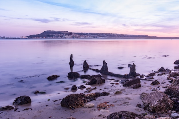 Stunning Long Exposure of Shoreline Stones Near Portland, Weymouth, Dorset, UK – Free Download