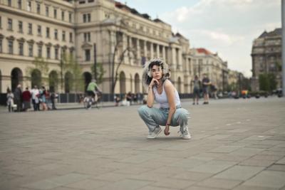 Young Woman Posing in a Square – Free Stock Photo for Download