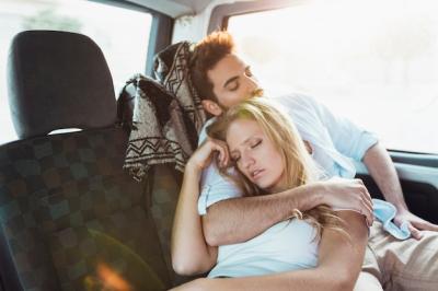 Couple Relaxing in Backseat – Free Stock Photo for Download