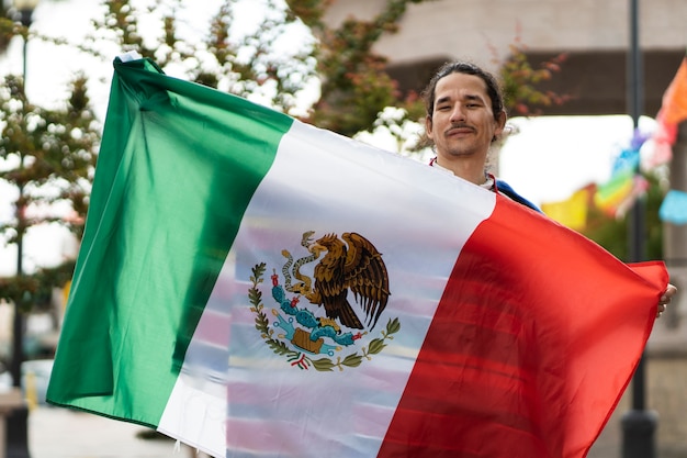 Front View Proud Man Holding Mexican Flag – Free Stock Photo for Download