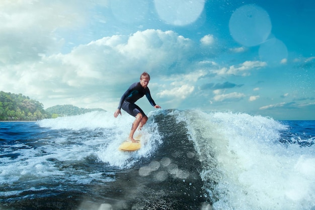 Surfer Riding a Blue Ocean Wave | Free Stock Photo – Download Free