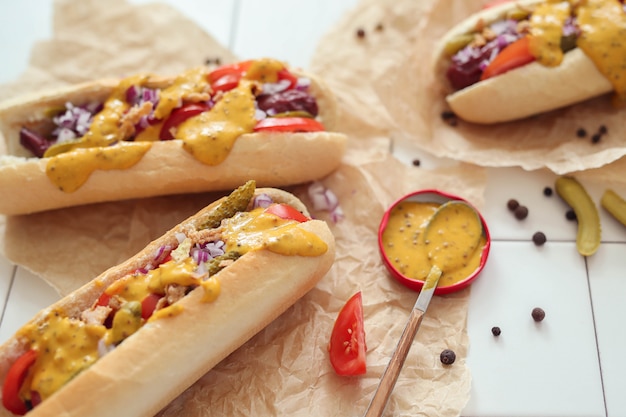 Hot Dog with Sauce on White Surface – Free Download