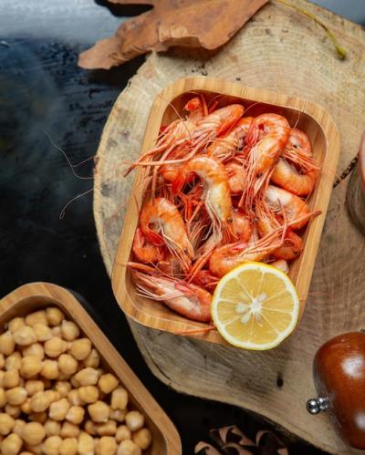 Boiled Shrimp with Lemon Half in Bamboo Serving – Free Download