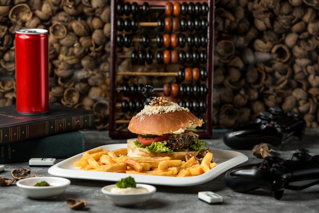 Delicious Hamburger and French Fries on the Table – Free Stock Photo for Download