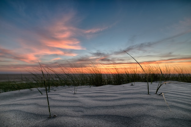 Breathtaking Sunset Over the Beach with a Sandy Shore – Free Download