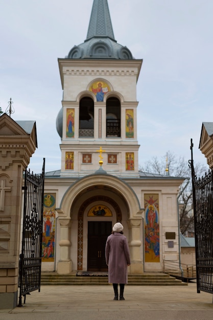 Religious Pilgrimage: Woman Visiting Church | Free Stock Photo for Download