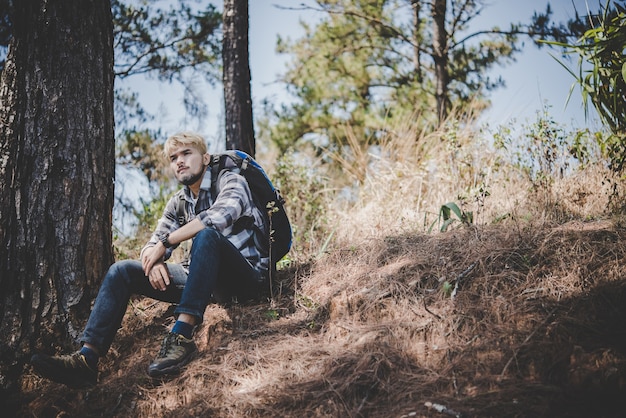 Young Tired Hiker Resting on Mountain Top – Free Stock Photo, Download Free