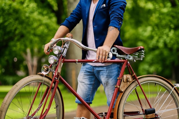 Close Up Image of a Man on a Retro Bicycle – Free Download