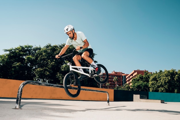 Bmx Rider Performing Tricks in Skatepark – Free to Download