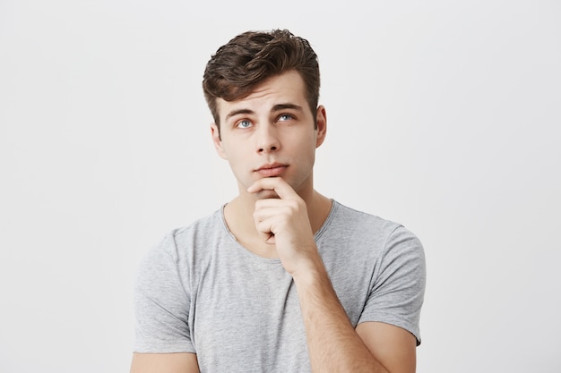 Concentrated Thoughtful Male Student Evaluating Chances to Pass Exam – Free Stock Photo, Download Free