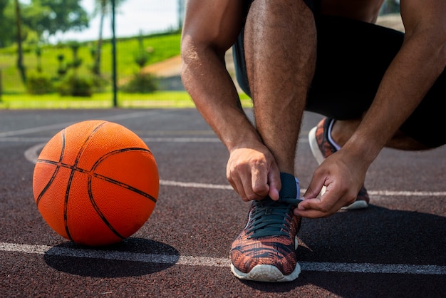 Handsome Man Tying His Laces – Free Download Free Stock Photo