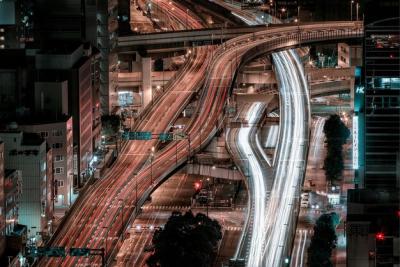 A Stunning Cityscape at Night with a Freeway – Download Free Stock Photo