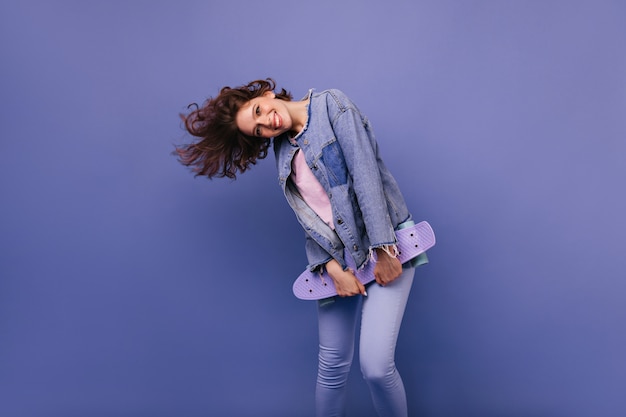 Joyful Caucasian Girl Dancing with a Skateboard – Free Stock Photo for Download