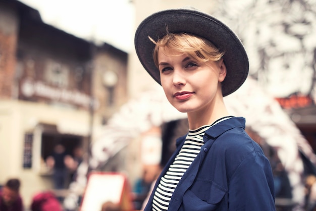 Waist Up of Woman Amidst Urban Architecture – Free Stock Photo for Download