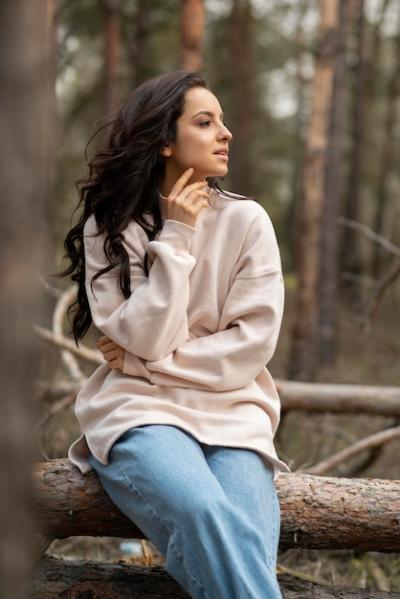 Low Angle Shot of a Woman in a Forest – Free Download