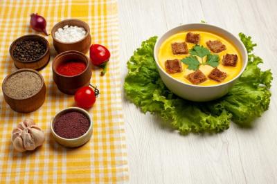 Pumpkin Soup with Bread Rusks and Seasonings on White Background – Free Download