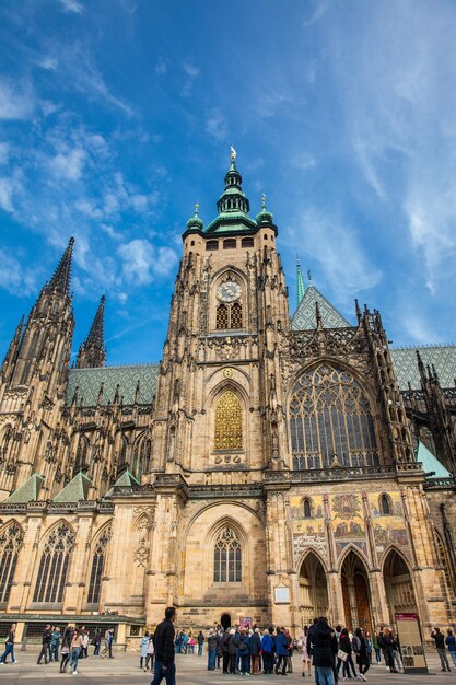 Tourists Exploring the Metropolitan Cathedral of Saints Vitus, Wenceslaus, and Adalbert in Prague – Free Download