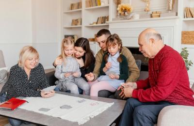 Family Enjoying a Game of Cards – Free Stock Photo for Download