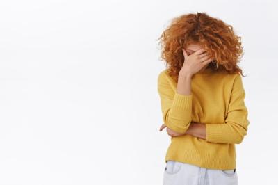 Redhead Woman in Yellow Sweater Closing Her Eyes – Free Download