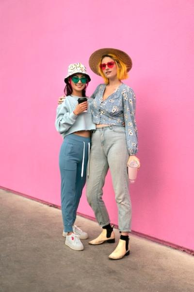 Young Women with Dyed Hair by Pink Wall – Free Stock Photo for Download