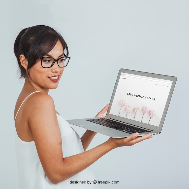 Mockup of a Young Woman with Laptop – Free to Download