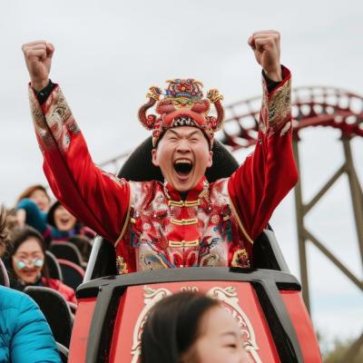 Young People Celebrating Chinese New Year at Amusement Park – Free Stock Photo, Download for Free