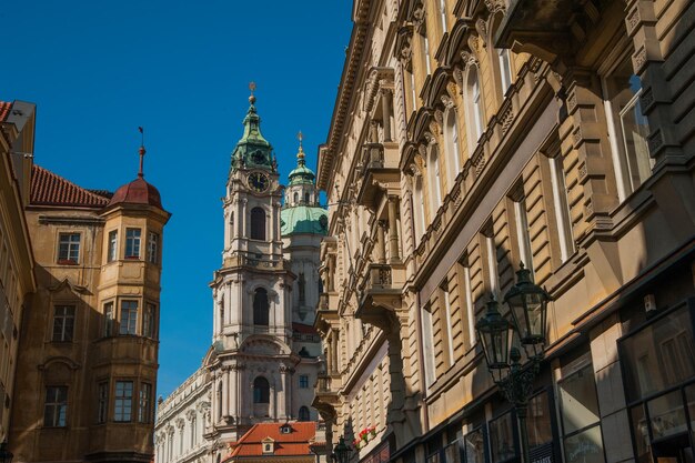 Nicholas Church and the Iconic Rooftops of Mostecka Street: Free Download