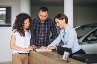 Young Couple Buying a Car in a Showroom – Free Stock Photo, Download for Free