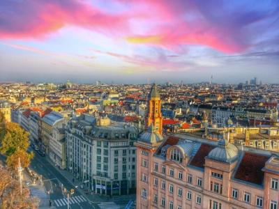 Aerial View of Cityscape Against Cloudy Sky – Free Download