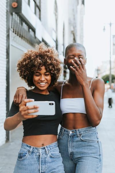 Cute Girls Making a Video Call – Free to Download Stock Photo