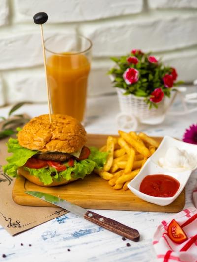 Hamburger and French Fries on Wooden Board with Ketchup and Mayonnaise – Free Download