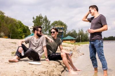 Male Friends in Sunglasses Relaxing on the Beach – Free Stock Photo, Download for Free