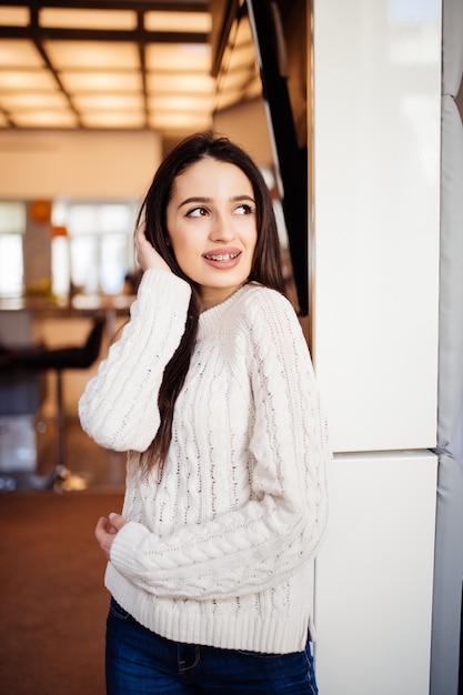 Young Beautiful Model with Big Eyes and Red Lips in Her Home – Free Stock Photo for Download