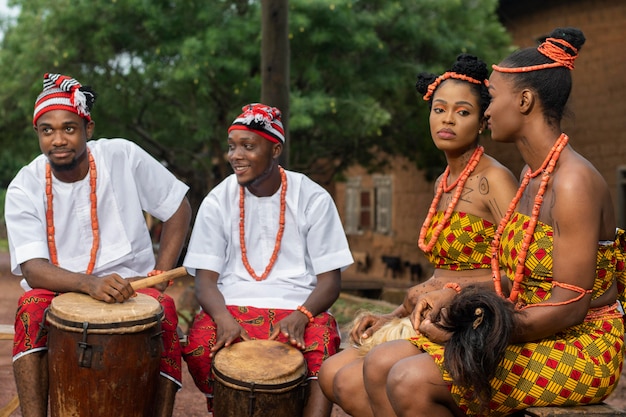 Medium Shot of Nigerian Dancers with Drums – Free Download