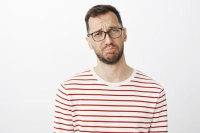 Gloomy Man with Beard and Glasses Complaining to Friend – Free Download