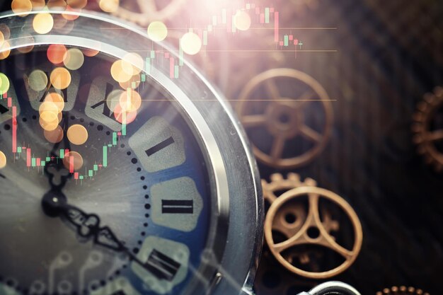 Macro shot of old mechanical clock gears and cogwheels on wooden background – free download