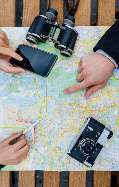 People Navigating and Holding Phone – Free Stock Photo for Download