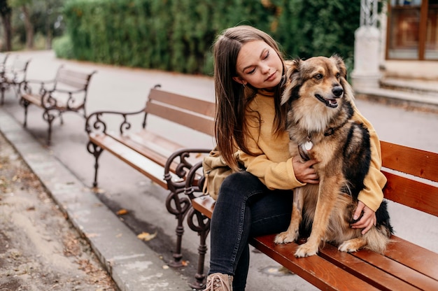 Pretty Young Woman with Her Dog – Free Download