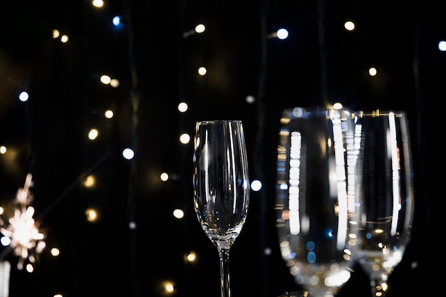 New Year Background Featuring Champagne Glasses – Free Download