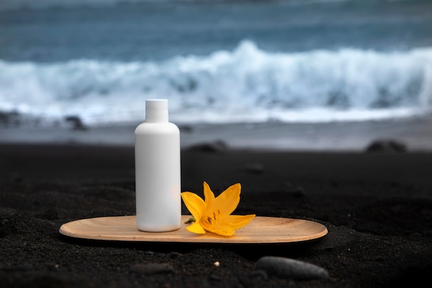 Skincare Tube Product on Black Canarian Sand – Free Download