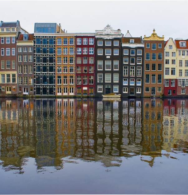 Stunning Reflection of Buildings in Canal – Free to Download