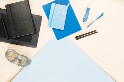 Various Stationeries on Colorful Paper Background – Free Download