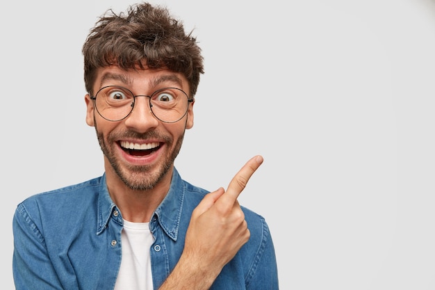 Joyful Man with Broad Smile and Funny Expression – Free Stock Photo Download