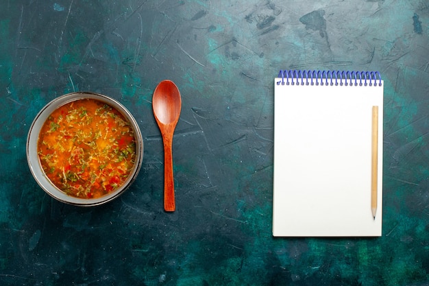 Delicious Vegetable Soup in a Plate on Green Surface – Free Download