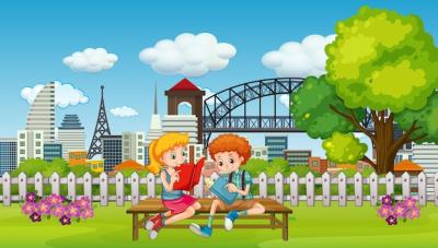 Children Reading a Book in the Park – Free Download