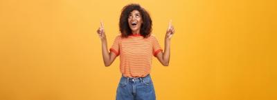 Charming African American Woman with Afro Hairstyle in Trendy T-Shirt and Denim Shorts – Free Download