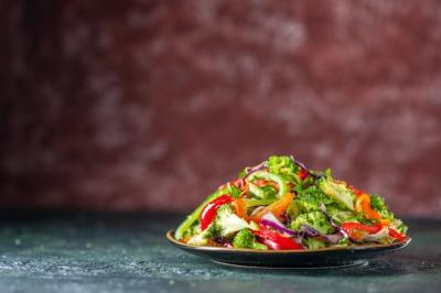 Delicious Vegan Salad with Fresh Ingredients on a Blurred Background – Free Stock Photo for Download