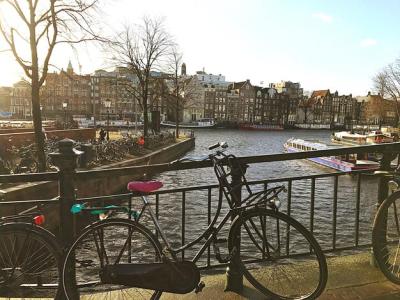 Bicycle Parked by Canal on Bridge in City – Free Stock Photo for Download