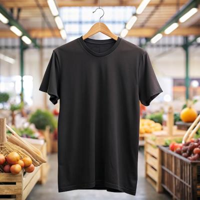 A Black Shirt Hanging on a Hanger – Download Free Stock Photo