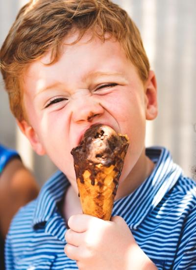 Little Boy Enjoying an Ice Cream – Free Stock Photo for Download
